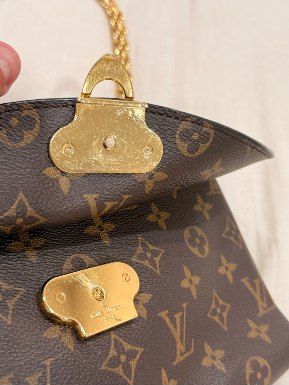 Louis Vuitton Saint Placide brown monogram with red trim